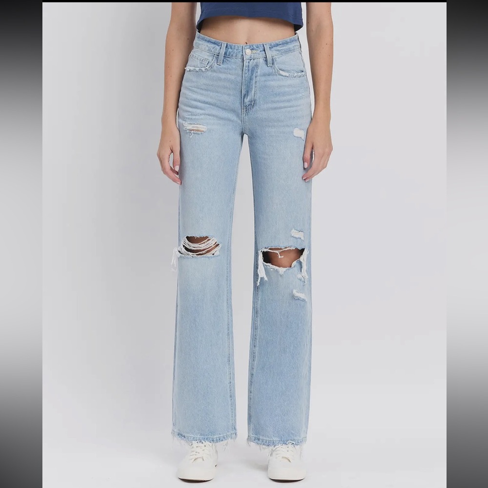 Light Wash Distressed Flare Jeans - Women